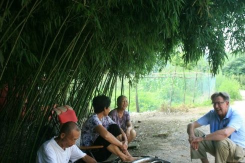 Talking with farmers in small village near Tangzhi